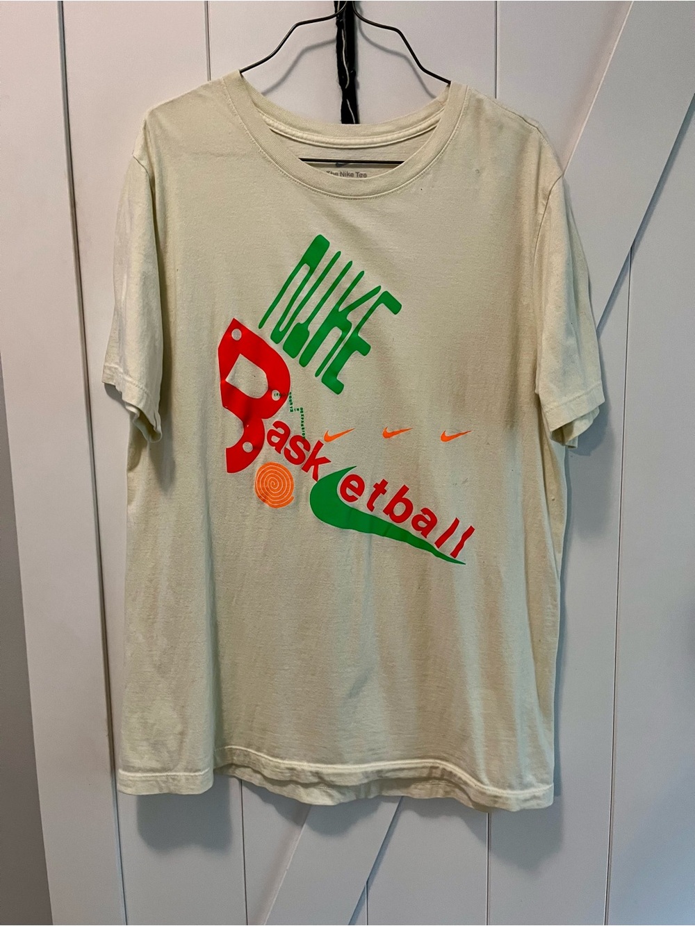 Nike Cream Tee with Green and Red Basketball Graphics